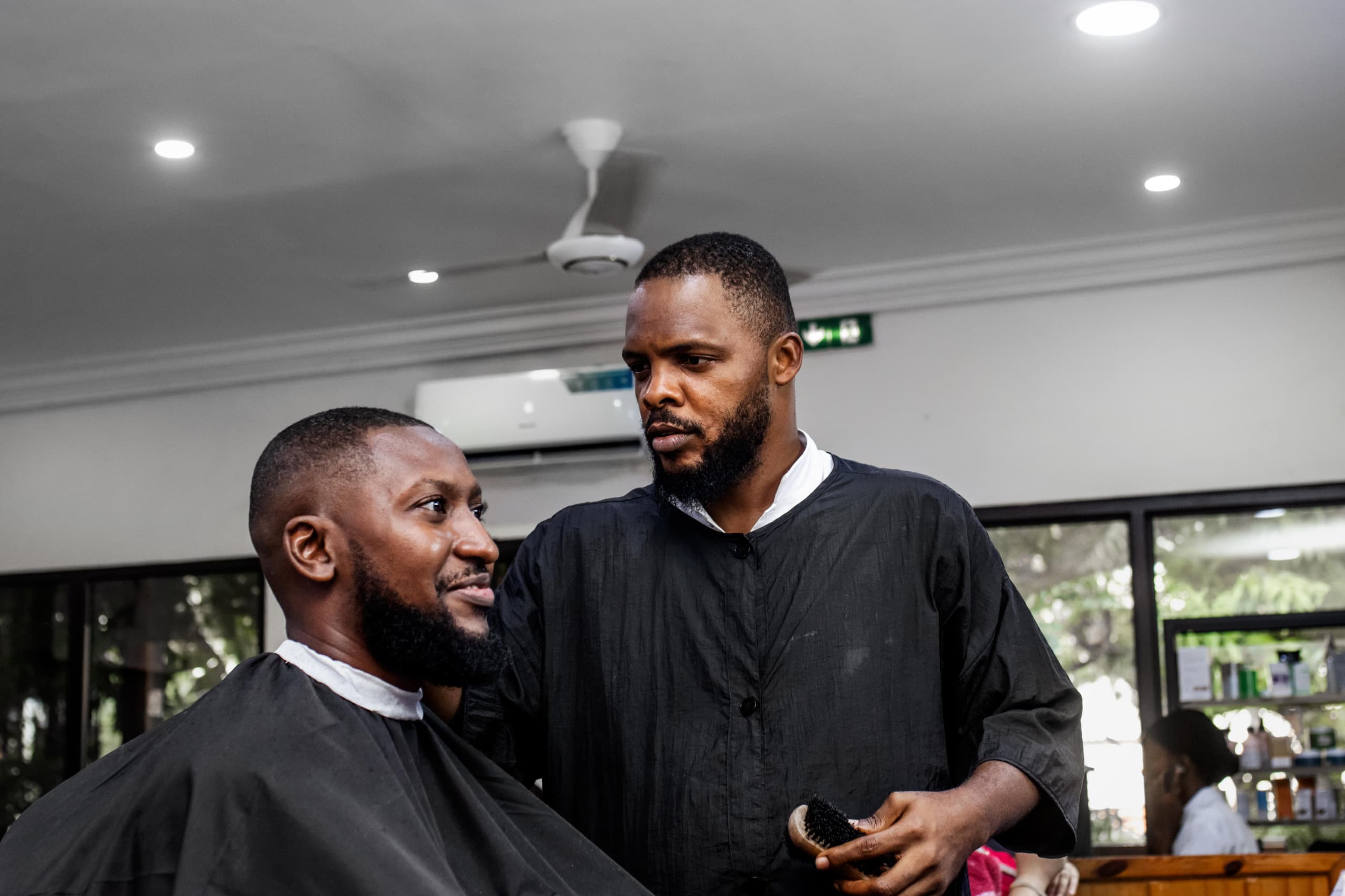 Guest smiling after a haircut